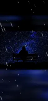 Silhouette sitting under a starry night sky, capturing the vastness of the galaxy.