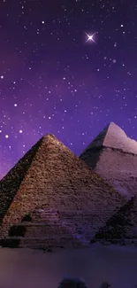 Mystical pyramids under a starry purple night sky wallpaper.