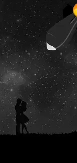 Couple's silhouette under starry sky with cosmic background.