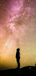 Silhouette gazing at a starry pink-purplish night sky on mobile wallpaper.