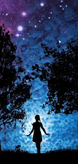 Silhouette under a starry blue night sky with trees.