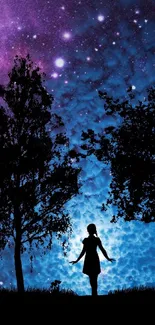 Silhouette of a girl under a starry night sky among trees.