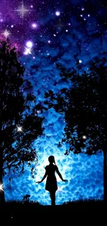 Silhouette of a girl under a starry blue night sky.