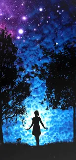 Silhouette of a figure between two trees under a starry sky.