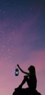 Silhouette with lantern under starry night sky wallpaper.