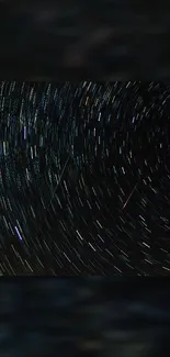 Mesmerizing star trails forming a swirling pattern in the night sky.