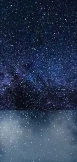 Starry night sky wallpaper with deep blue and black tones and scattered stars.