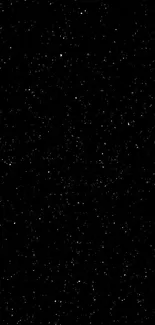 Black wallpaper with scattered white stars, resembling a serene night sky.