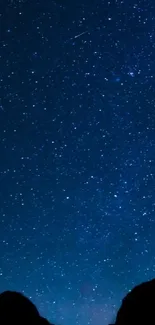 Starry night sky mobile wallpaper with deep blue celestial scene.