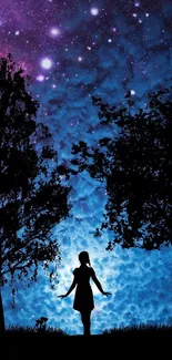 Silhouette of woman under starry blue night sky.