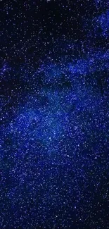 Starry night sky wallpaper with deep blue hues and sparkling stars.