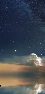 Sailing boat under a starry night sky with calm reflective water.