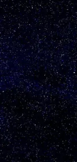 Starry night sky wallpaper with deep blue hues and twinkling stars.