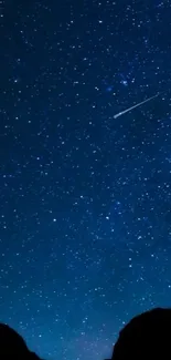 Starry night sky with shooting star wallpaper.