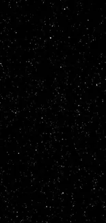 Starry night sky with countless tiny stars shimmer on a dark black background.