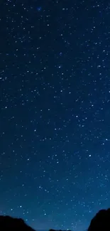 Starry night sky mobile wallpaper with blue hues and sparkling stars.