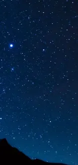 Starry night sky wallpaper with deep blue and twinkling stars.