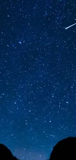 Starry night sky with shooting star wallpaper for mobile phone.