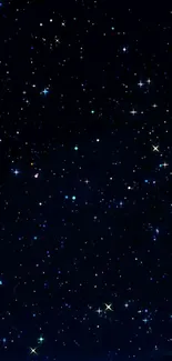 Mesmerizing starry night sky wallpaper with sparkling stars on a dark blue background.