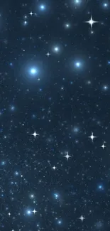 Starry deep blue night sky wallpaper with twinkling stars.