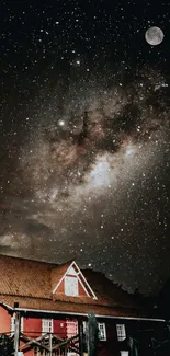 Starry sky over barn with moon and Milky Way in wallpaper format.