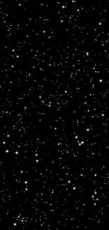 Black wallpaper with white twinkling stars in a night sky.