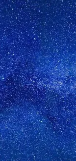 Vivid blue starry night sky wallpaper with sparkling stars.