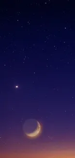 Starry night sky with crescent moon and twilight glow.