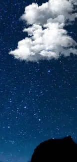 Starry night sky wallpaper with a fluffy cloud.