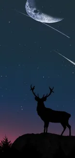 Deer silhouette under a starry sky with moon and shooting stars wallpaper.