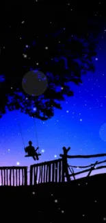 Silhouette of a swing against a starry blue night sky.