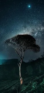 Lone tree under a starry night sky with a cosmic background.