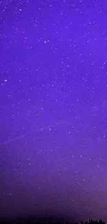 Starry purple night sky with scattered stars.