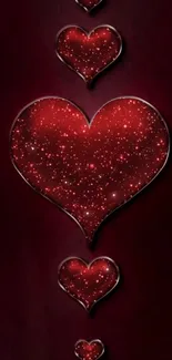 Starry pattern of red hearts on dark background wallpaper.