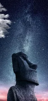 Starry night sky with Moai statue silhouette.