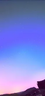 Starry twilight sky with blue and purple gradient in mobile wallpaper.