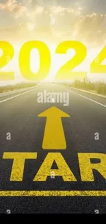 2024 start journey on a road with bright yellow text.