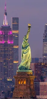 Statue of Liberty with New York skyline at dusk, glowing under city lights.