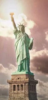 Statue of Liberty at sunset with a glowing sky background.