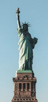 Statue of Liberty under clear blue sky.