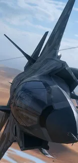 Stealth fighter jet soaring over desert landscape with cloudy sky.