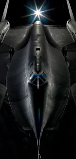 Stealth jet in a dark hangar with dramatic lighting.