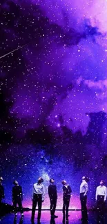 Purple cosmic night sky wallpaper with stars.