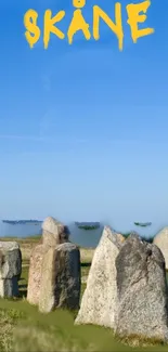 Scenic Skåne stone circle against blue sky.