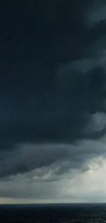 Stormy ocean with dark, brooding clouds.