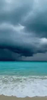 Dramatic stormy ocean scene with dark clouds and turquoise water.