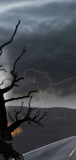 Stormy sky over a deserted road with dark clouds and barren trees.