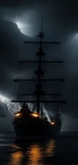 Sailing ship on dark stormy ocean with lightning in the night sky.