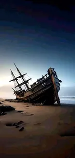 Shipwrecked vessel on beach at sunset.