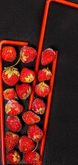 Red strawberries with straws on dark background wallpaper.